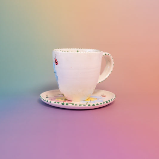 Taza con asa + platito  una flor solitaria